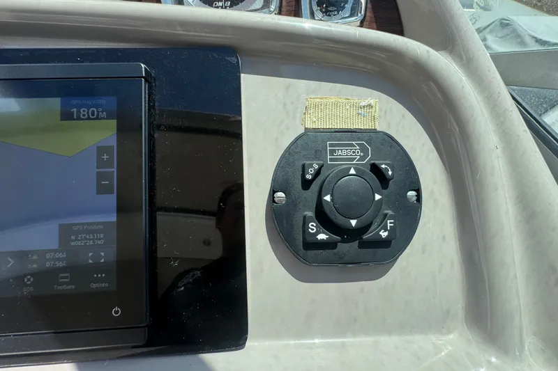 Slide: The Image of Control panel of a 2008 Chaparral Signature 290 boat with GPS and Jabsco joystick. - 65
