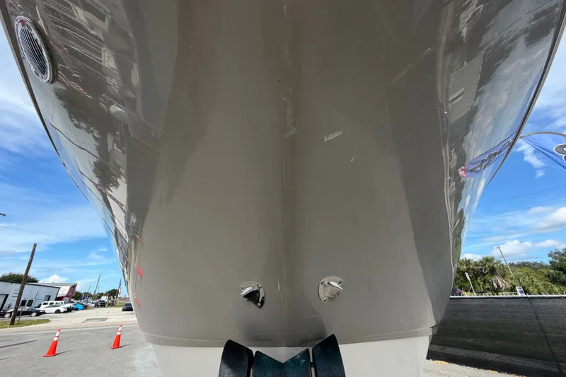 Slide: The Image of 2008 Chaparral Signature 290 boat hull, close-up view, outdoors with blue sky background. - 14