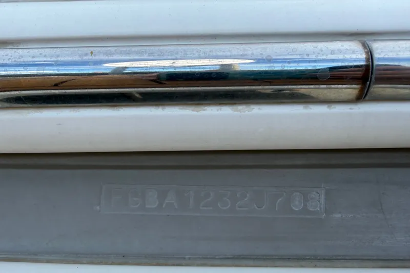 Slide: The Image of 2008 Chaparral Signature 290 hull identification number on boat exterior. - 119