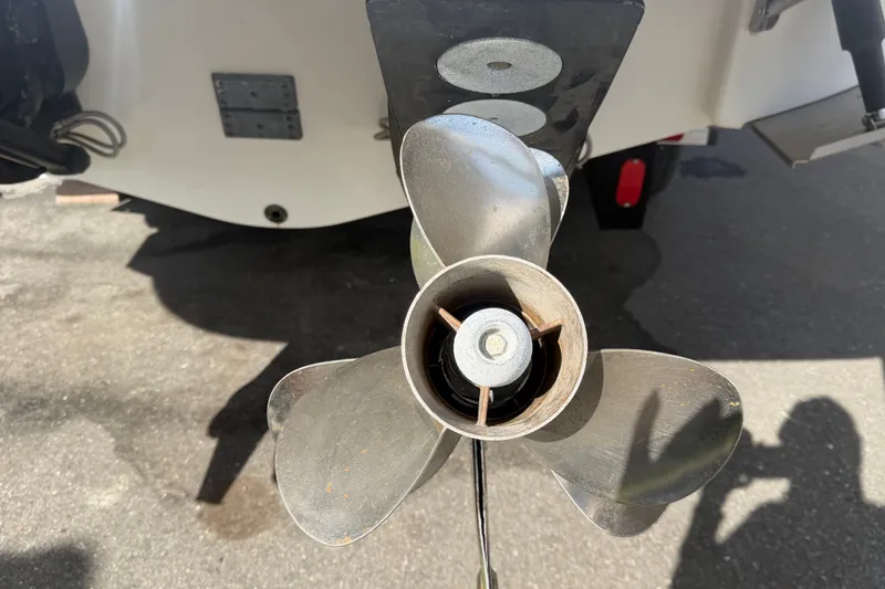 Slide: The Image of Propeller of 2008 Chaparral Signature 290 boat on pavement background. - 5