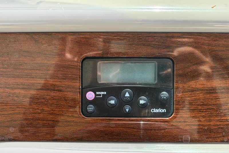 Slide: The Image of Clarion audio system on 2008 Chaparral Signature 290 boat dashboard. - 37