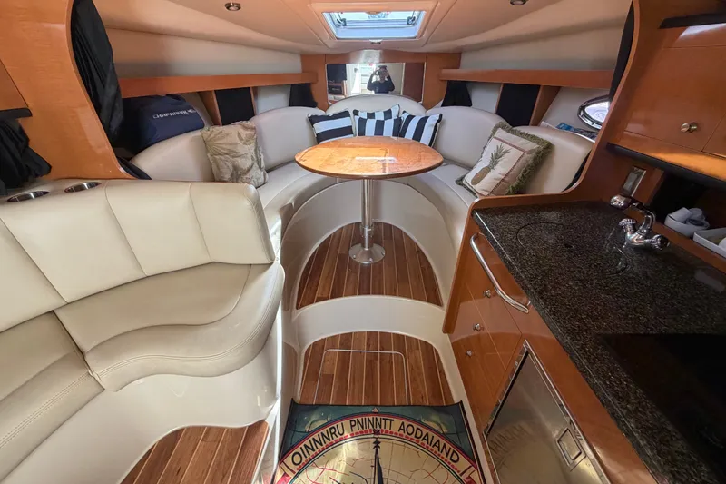 Slide: The Image of Interior of 2008 Chaparral Signature 290 boat with elegant seating and wooden flooring. - 60