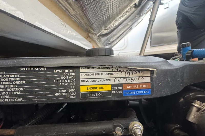Slide: The Image of Engine specifications of a 2008 Chaparral Signature 290 boat, showing serial numbers and fluid color codes. - 78