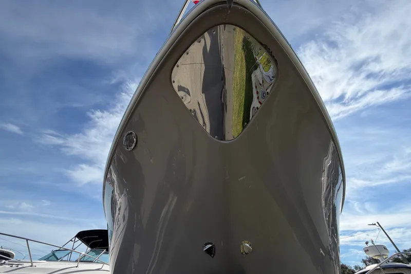 Slide: The Image of 2008 Chaparral Signature 290 boat bow against a blue sky background. - 9