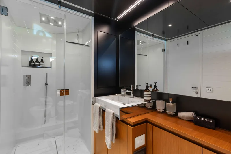 Slide: The Image of Luxurious bathroom on 2020 Riva 90 Argo yacht with modern fixtures and elegant design. - 38