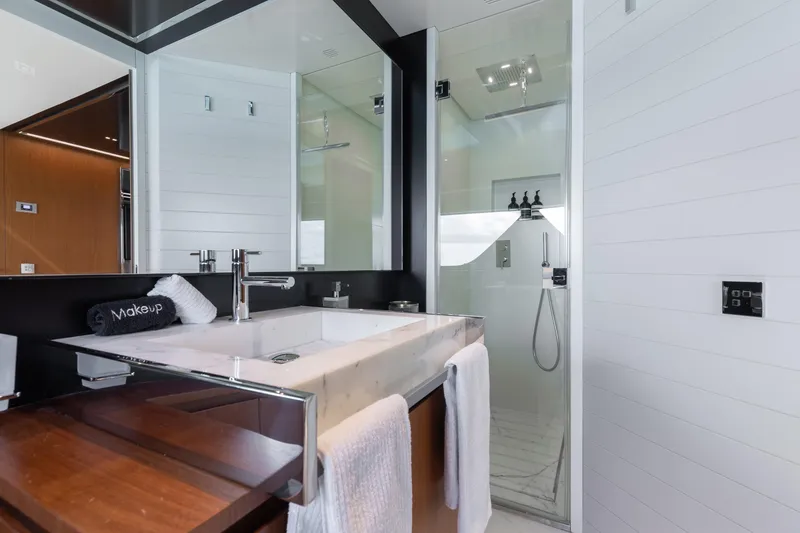 Slide: The Image of Luxurious bathroom on 2020 Riva 90 Argo yacht with modern fixtures and elegant design. - 35