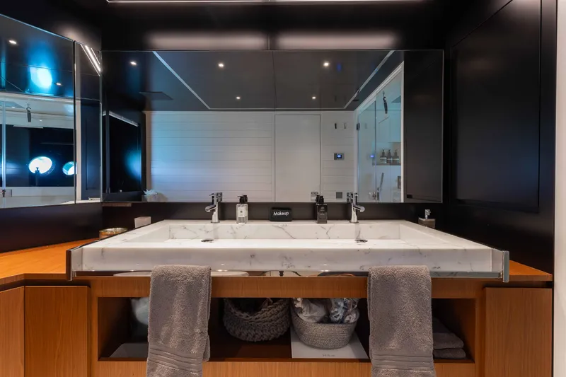 Slide: The Image of Luxurious bathroom on 2020 Riva 90 Argo yacht with marble sink and modern fixtures. - 26