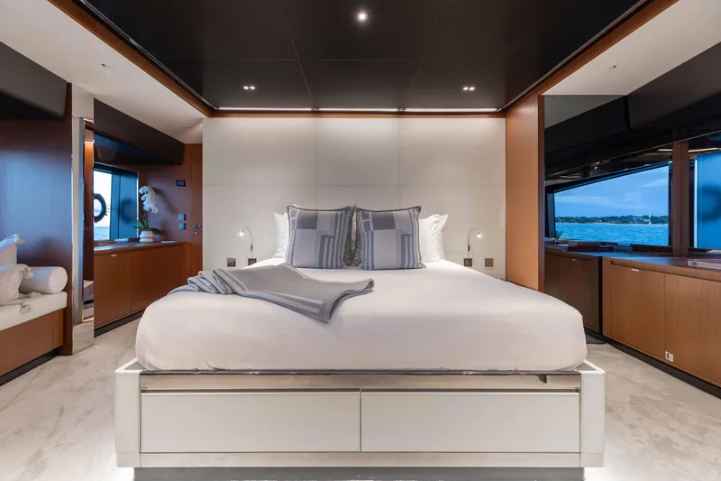 Slide: The Image of Luxurious bedroom interior on 2020 Riva 90 Argo yacht with ocean view. - 21