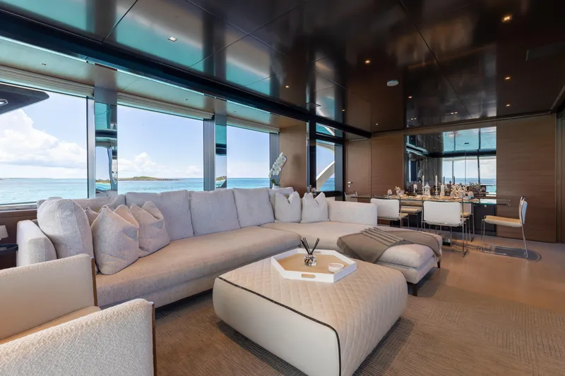 Slide: The Image of Luxurious interior of 2020 Riva 90 Argo yacht with elegant seating and ocean view. - 14