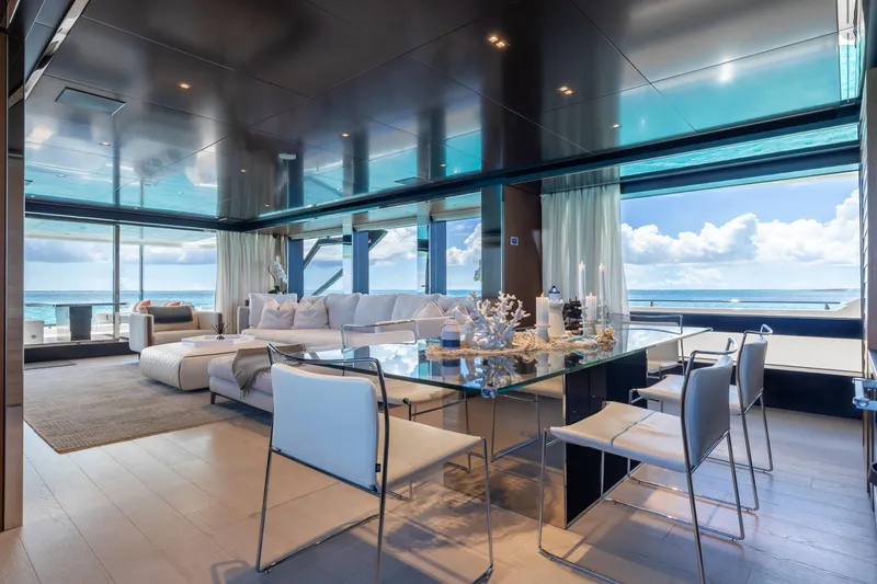 Slide: The Image of Luxurious interior of 2020 Riva 90 Argo yacht with ocean view and modern decor. - 17