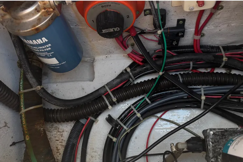 Slide: The Image of 2008 Grady-White Seafarer 226 boat wiring and fuel filter system. - 69