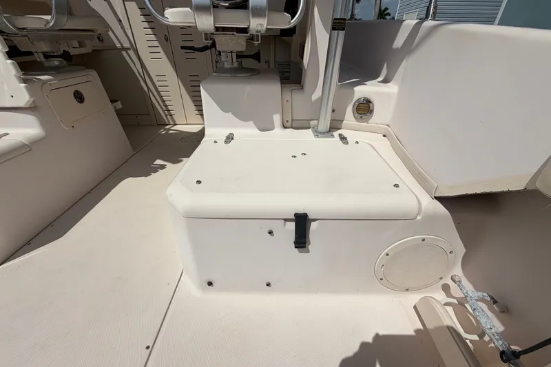 Slide: The Image of 2008 Grady-White Seafarer 226 boat interior, featuring seating and storage compartments. - 51