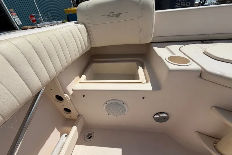 Slide: The Image of 2008 Grady-White Seafarer 226 boat interior with seating and storage compartment. - 59