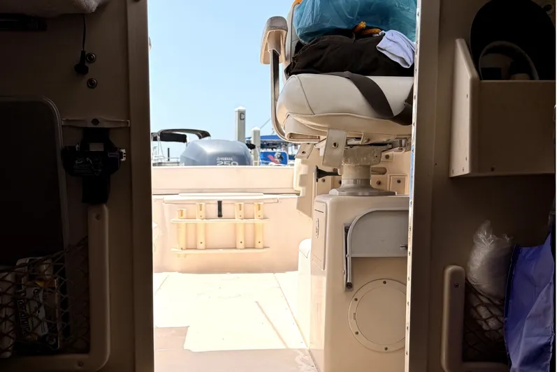 Slide: The Image of Interior view of 2008 Grady-White Seafarer 226 boat cabin, showing seating and storage. - 34