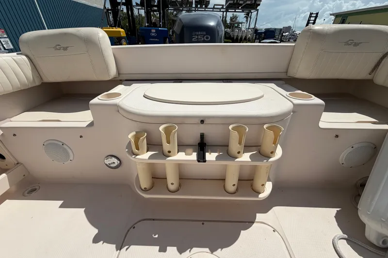 Slide: The Image of 2008 Grady-White Seafarer 226 boat interior with rod holders and seating. - 56