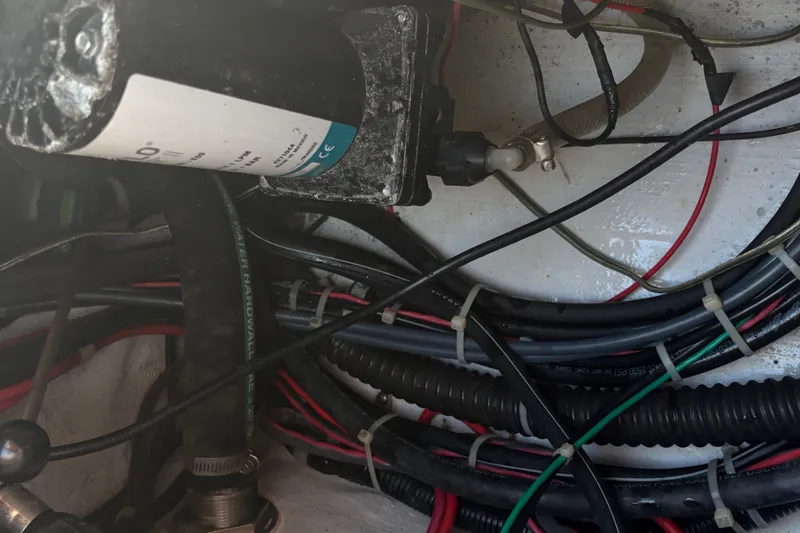 Slide: The Image of Electrical wiring and components inside a 2008 Grady-White Seafarer 226 boat. - 71