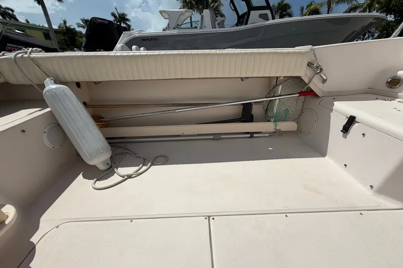 Slide: The Image of 2008 Grady-White Seafarer 226 boat interior with storage and equipment. - 55