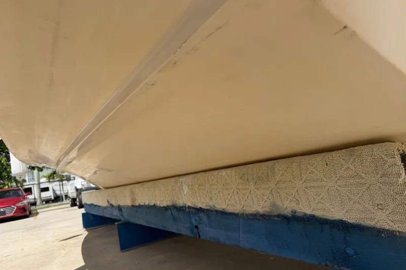 Slide: The Image of 2008 Grady-White Seafarer 226 boat hull on trailer, close-up view. - 67