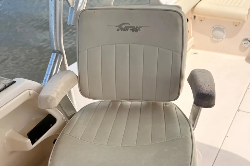 Slide: The Image of Grady-White Seafarer 226 boat seat, 2008 model, with armrests and logo. - 44