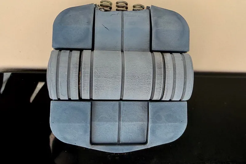 Slide: The Image of Close-up of a blue rubber boat bumper for a 2008 Grady-White Seafarer 226. - 68