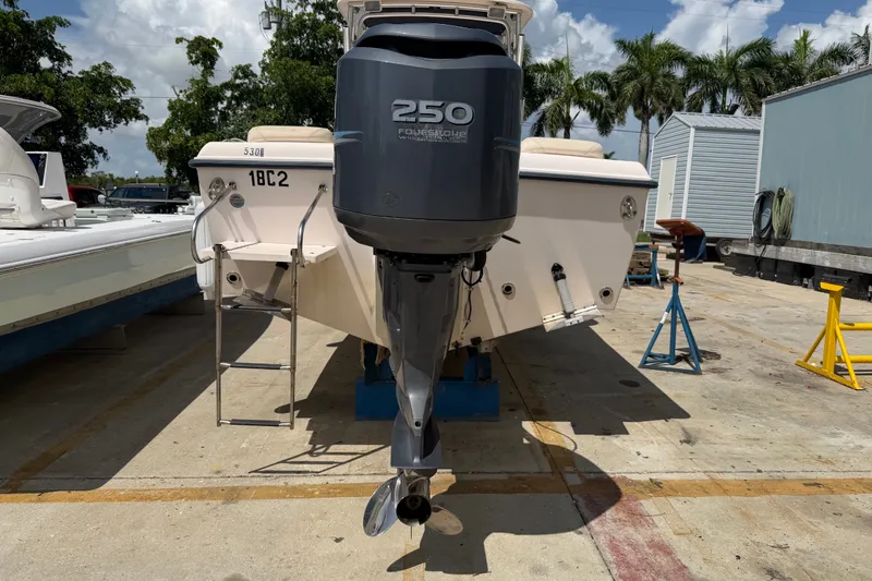 Slide: The Image of 2008 Grady-White Seafarer 226 boat with powerful 250 HP outboard motor on display. - 48