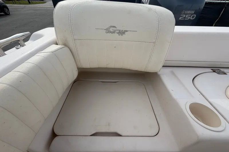 Slide: The Image of 2008 Grady-White Seafarer 228 boat seat with cup holder and logo. - 73