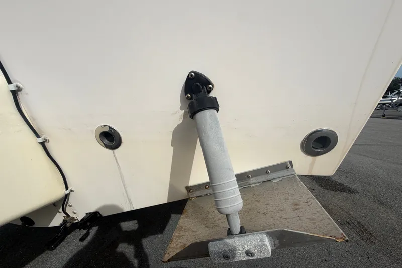 Slide: The Image of 2008 Grady-White Seafarer 228 boat transom with trim tab and hydraulic actuator. - 5