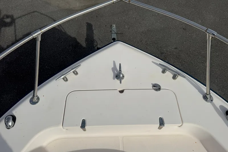Slide: The Image of Bow of 2008 Grady-White Seafarer 228 boat with stainless steel railings. - 57