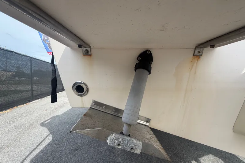 Slide: The Image of 2008 Grady-White Seafarer 228 boat transom with trim tab and drain plug. - 6
