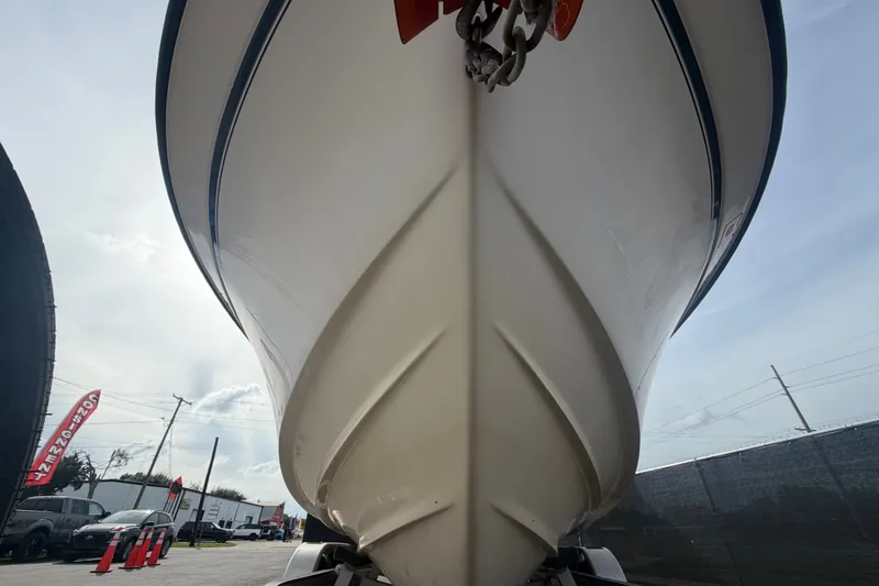 Slide: The Image of 2008 Grady-White Seafarer 228 boat hull, viewed from below, in outdoor setting. - 11