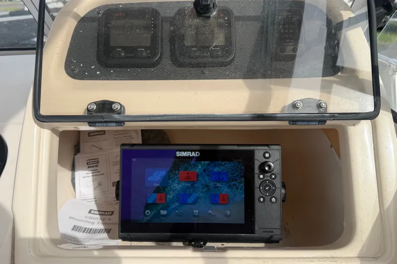 Slide: The Image of Simrad navigation system on 2008 Grady-White Seafarer 228 boat dashboard. - 39