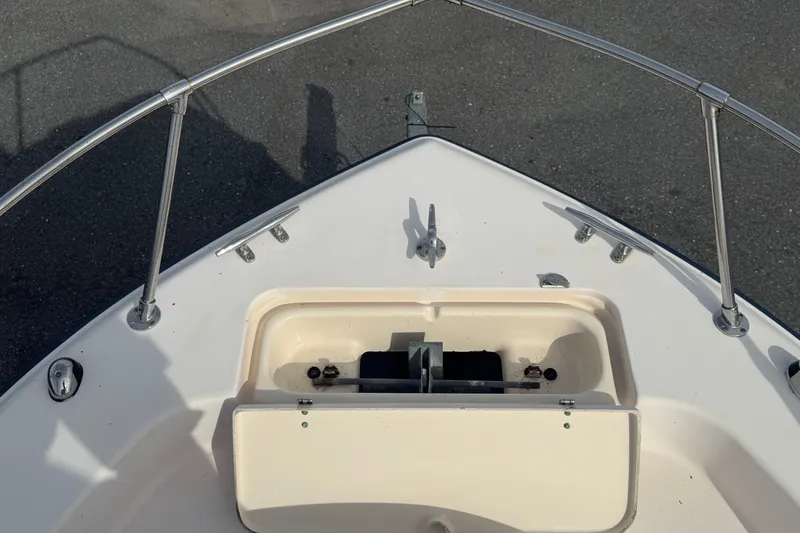 Slide: The Image of Bow of 2008 Grady-White Seafarer 228 boat with anchor storage compartment. - 58