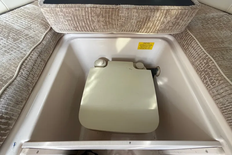Slide: The Image of 2008 Grady-White Seafarer 228 boat interior with built-in storage compartment. - 48
