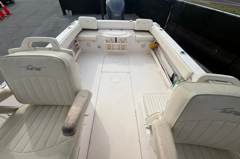 Slide: The Image of 2008 Grady-White Seafarer 228 boat interior with seating and storage compartments. - 66
