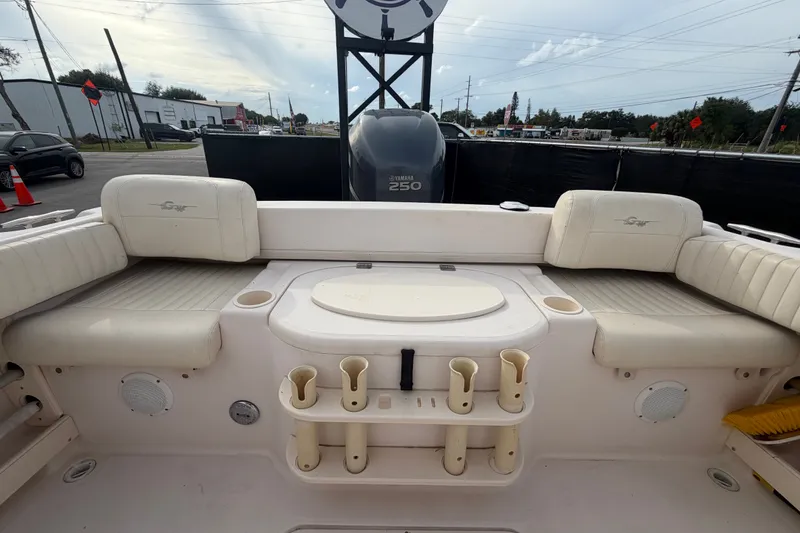 Slide: The Image of 2008 Grady-White Seafarer 228 boat interior with seating and rod holders. - 71