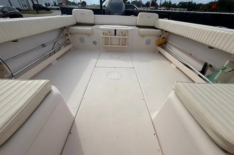 Slide: The Image of 2008 Grady-White Seafarer 228 boat interior with spacious seating and clean deck. - 67