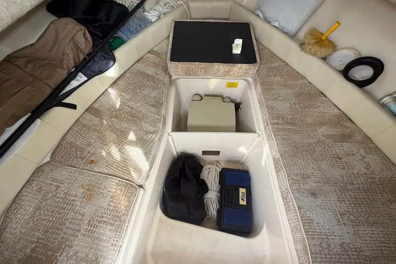 Slide: The Image of Interior of a 2008 Grady-White Seafarer 228 with storage compartments and accessories. - 47