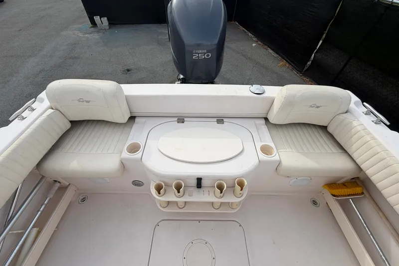 Slide: The Image of 2008 Grady-White Seafarer 228 boat interior with seating and Yamaha 250 engine. - 70