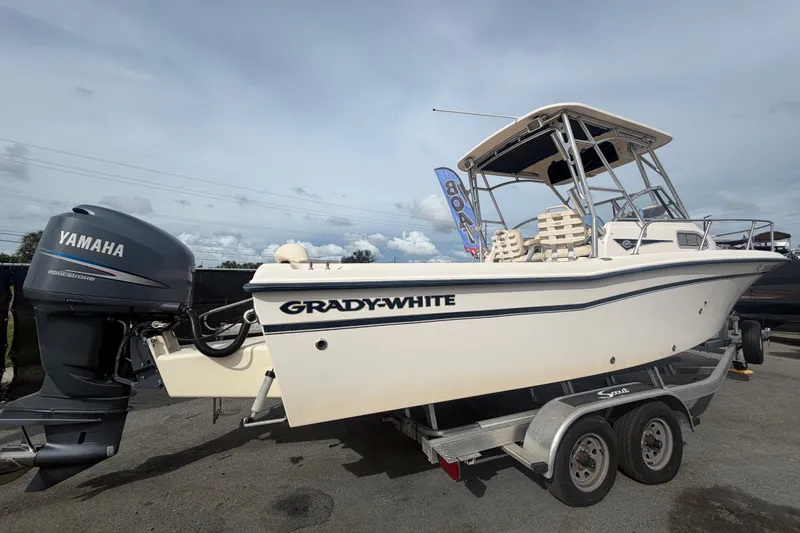 Slide: The Image of 2008 Grady-White Seafarer 228 boat with Yamaha engine on trailer. - 2