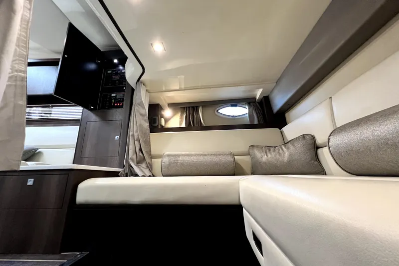 Slide: The Image of Interior of 2018 Monterey 355 Sport Yacht with modern seating and elegant design. - 82