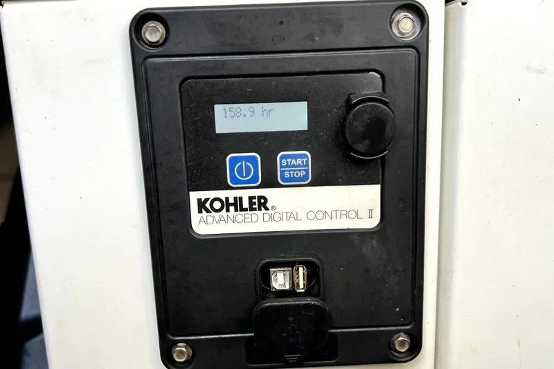 Slide: The Image of Kohler Advanced Digital Control II panel displaying 158.9 hours on a 2018 Monterey 355 Sport Yacht. - 118