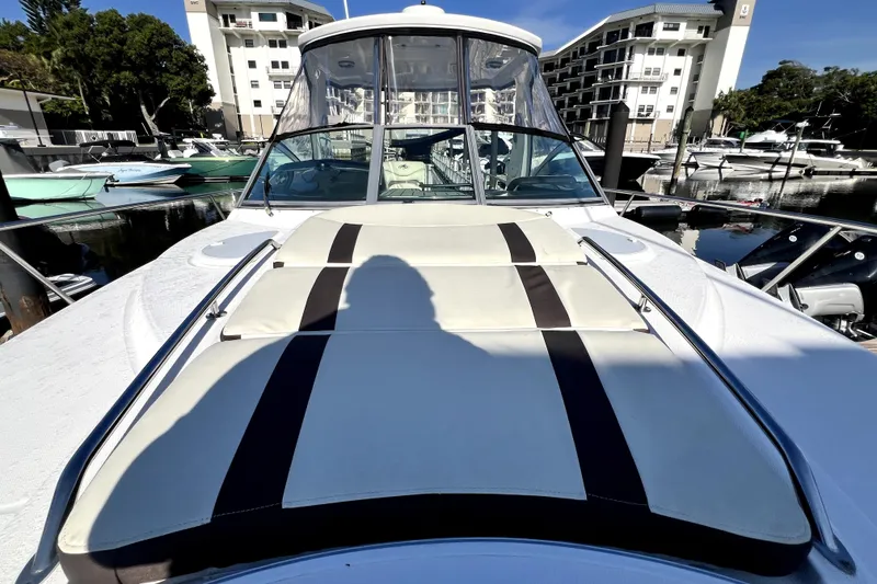 Slide: The Image of 2018 Monterey 355 Sport Yacht docked at marina with sunpad and clear skies. - 127