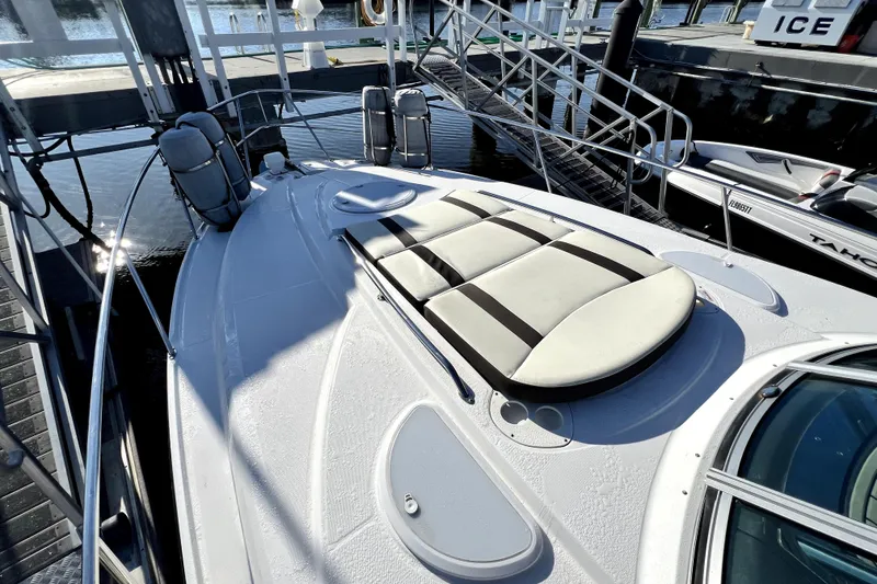 Slide: The Image of 2018 Monterey 355 Sport Yacht with sunpad, docked at marina. - 68