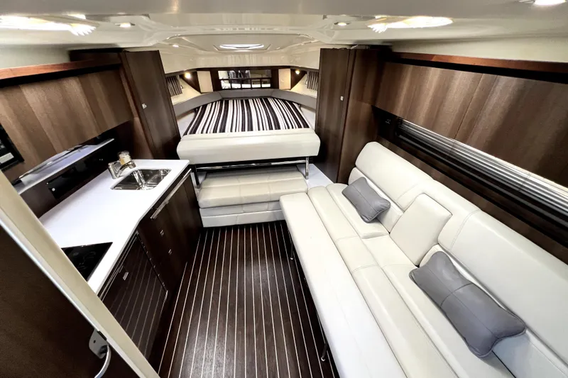 Slide: The Image of Luxurious interior of 2018 Monterey 355 Sport Yacht with modern kitchen and comfortable seating. - 49