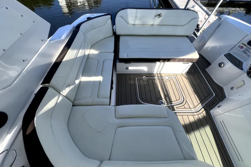 Slide: The Image of Luxurious seating area on a 2018 Monterey 355 Sport Yacht with elegant white upholstery. - 108