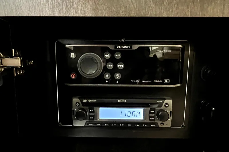 Slide: The Image of Fusion and Jensen audio systems in 2018 Monterey 355 Sport Yacht. - 73