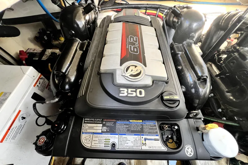 Slide: The Image of Engine of a 2018 Monterey 355 Sport Yacht, featuring a Mercury 6.2L 350 horsepower motor. - 120