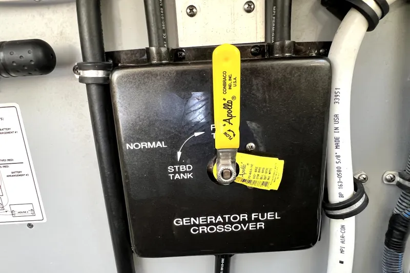 Slide: The Image of Generator fuel crossover switch on a 2018 Monterey 355 Sport Yacht. - 114
