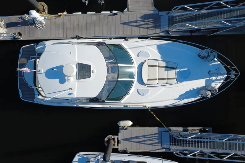 Slide: The Image of Aerial view of a 2018 Monterey 355 Sport Yacht docked at a marina. - 22