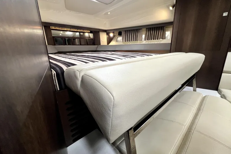 Slide: The Image of Luxurious interior of 2018 Monterey 355 Sport Yacht with elegant bedding and seating. - 51